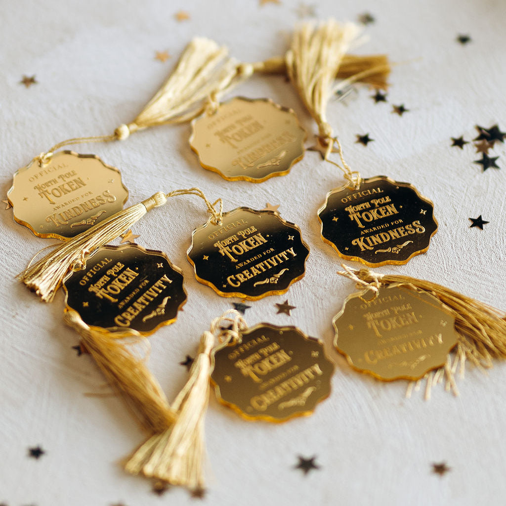 Gold tokens with gold tassels 